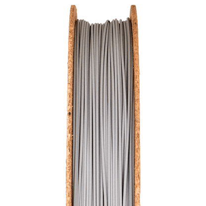 A spool of Stainless Steel 316L Filamet filament, designed for use in 3D printing.