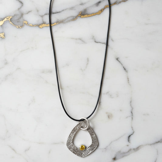 Artisan-Made Silver Necklace with Botanical Texture