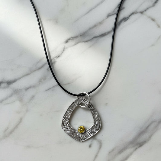 Artisan-Made Silver Necklace with Botanical Texture