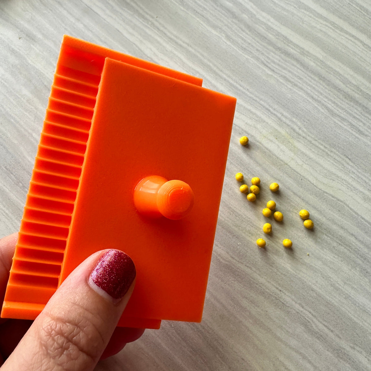 The BALLER polymer clay tiny petal bead ball making tool - Clay Revolution