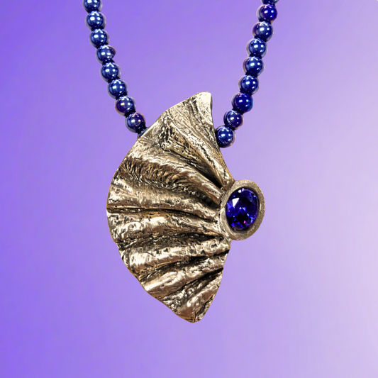 Dramatic Fan Fold Pendant with Carrie Story 2-5-27 Tucson